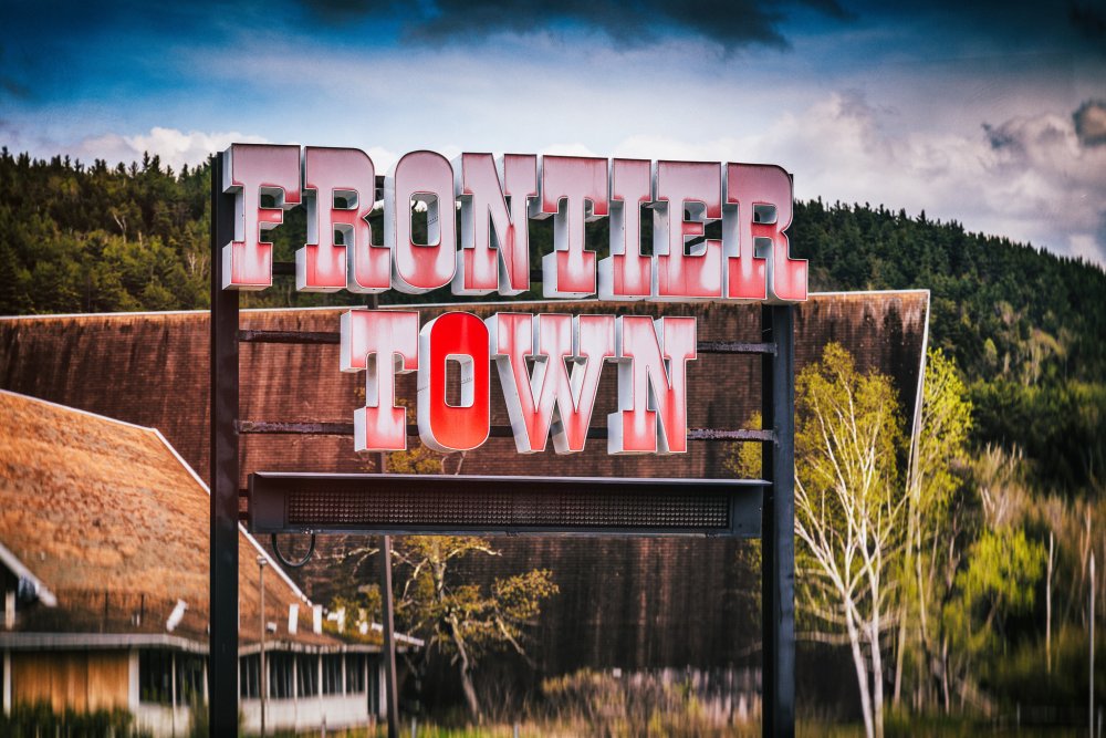 abandoned theme park Frontier Town sign