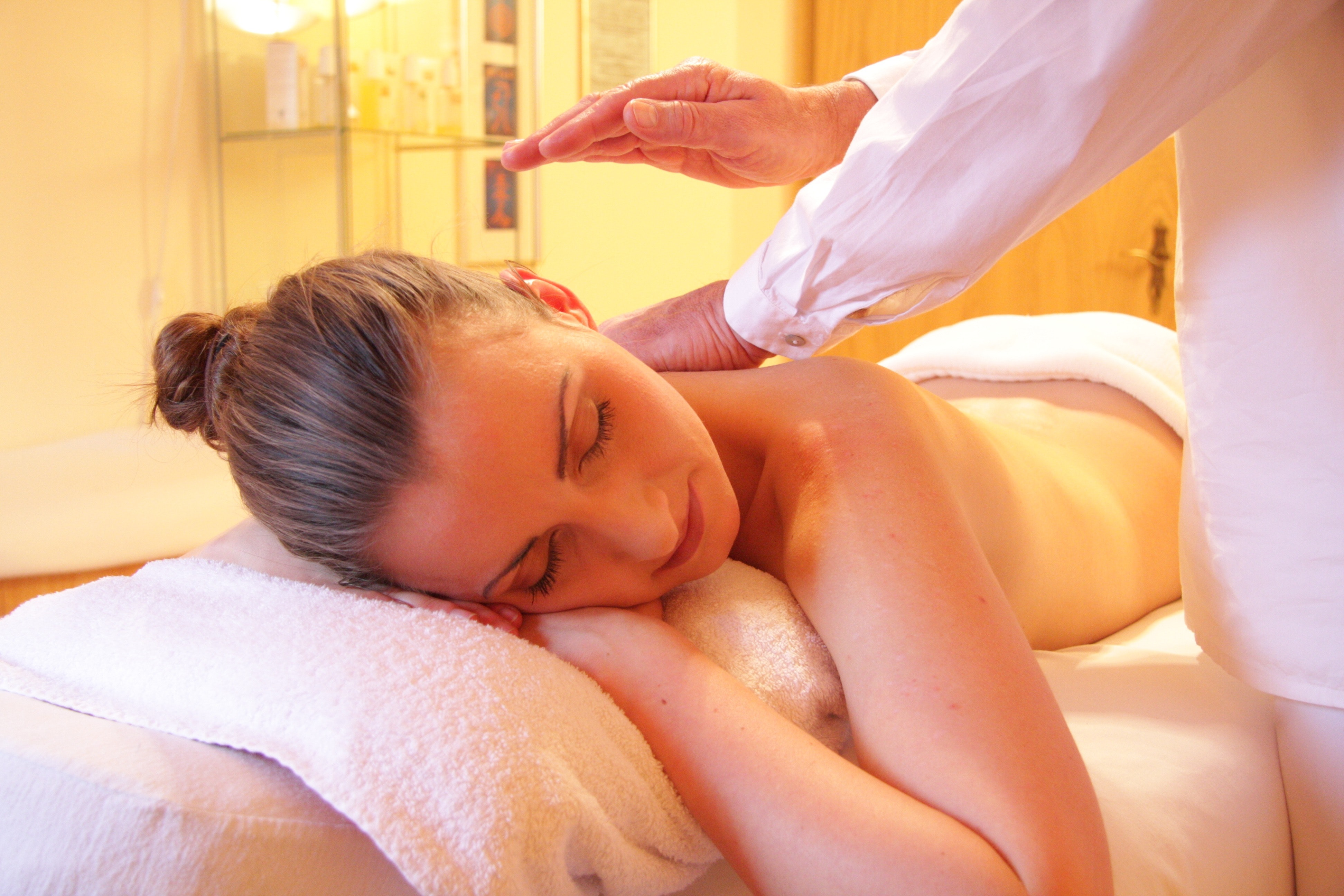woman receiving a massage at an Adirondack spa