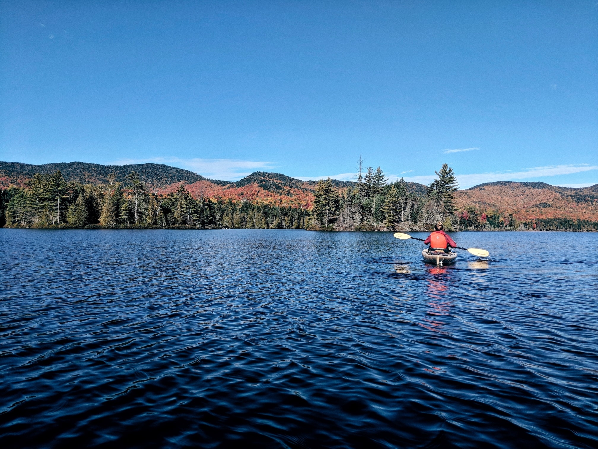 kayaking paddling in the Adirondacks during the fall