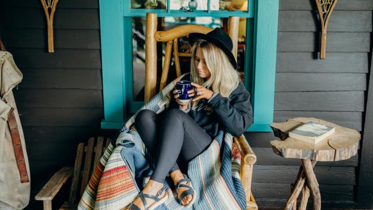 girl enjoying a cabin rental in the Adirondacks during the Spring