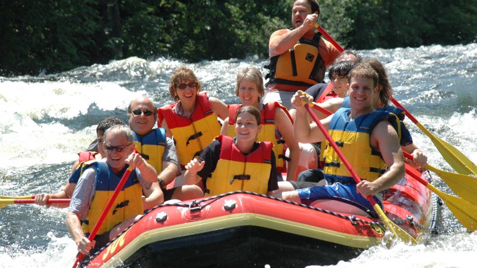 travel group whitewater rafting in the Adirondacks