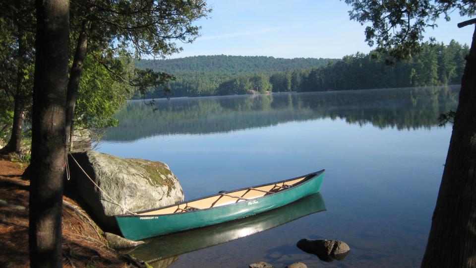 canoe sitting in an Adirondack paddling destination