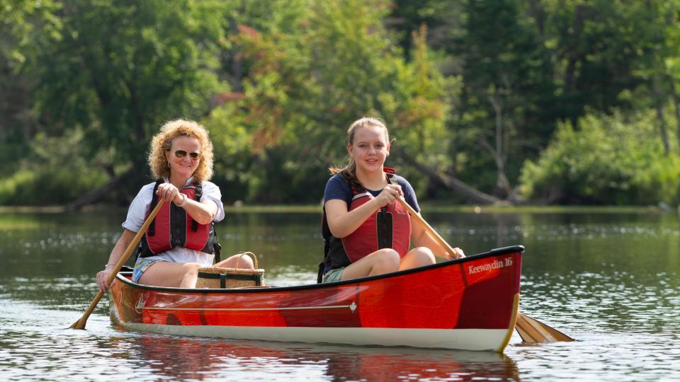 Mom and daughter in canoe