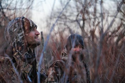 hunters dressed in camo