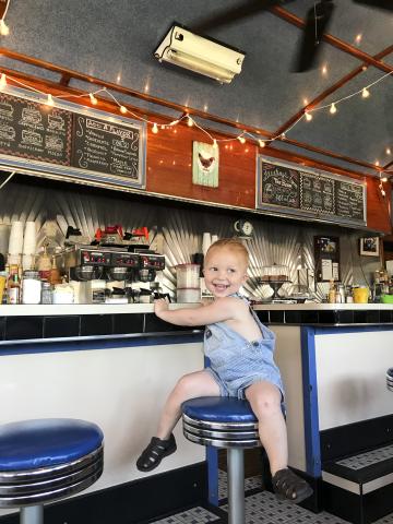child at an Adirondack diner